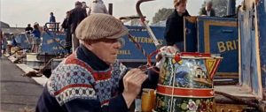 1960's boatman painting a water can